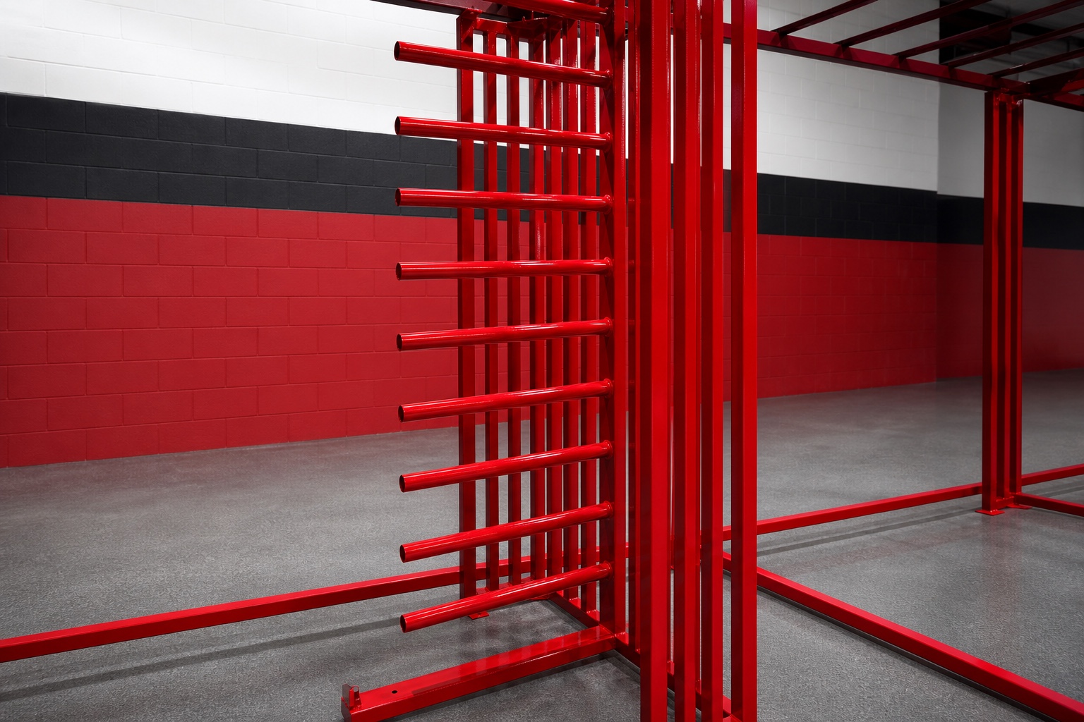 Custom red powder-coated commercial fabrication rack